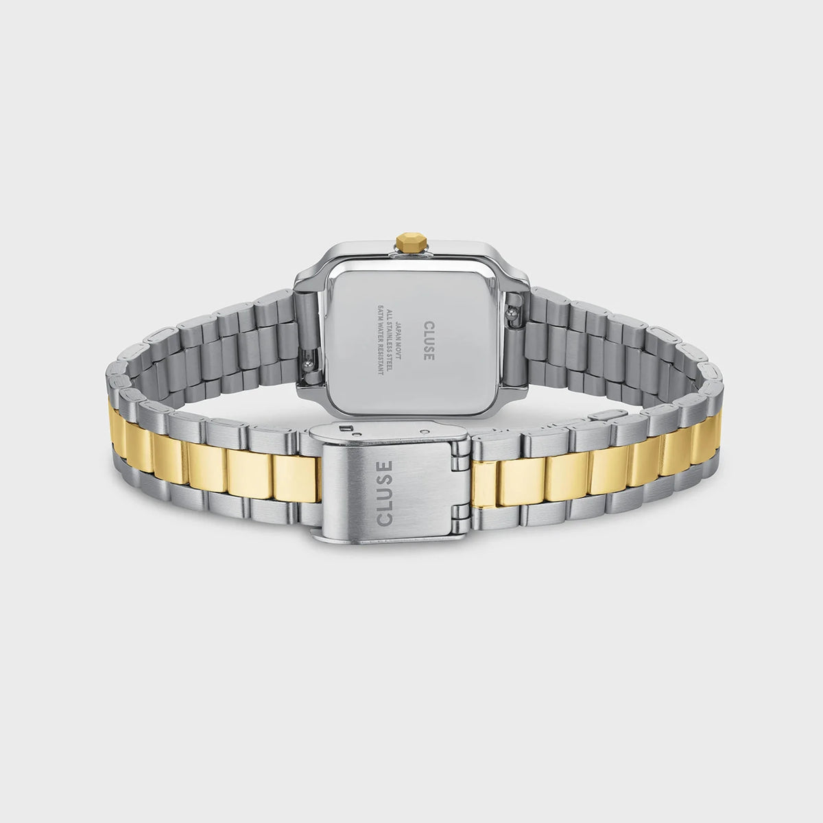 Blick auf das Armband und den Gehäuseboden der stahl-goldfarbenen Cluse Damenuhr Gracieuse Mini CW15501 mit quadratischen Gehäuse, einem weißem Zifferblatt und einem passenden stahl-goldfarbenen Uhrenarmband