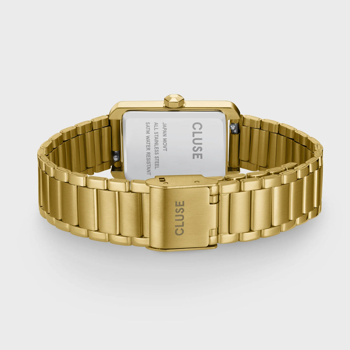 Blick auf das Armband, aufgebaut aus 3 Elementen, von der goldfarbenen Cluse Belisenna Damenuhr mit länglichem, rechteckigem Gehäuse und weißem Zifferblatt mit römischen Indizes