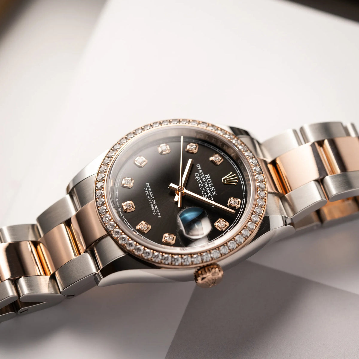 Rolex Datejust 36 126218RBR in Stahl-Roségold mit schwarzem Diamant-Zifferblatt und Diamant-Lünette im Factory-Besatz