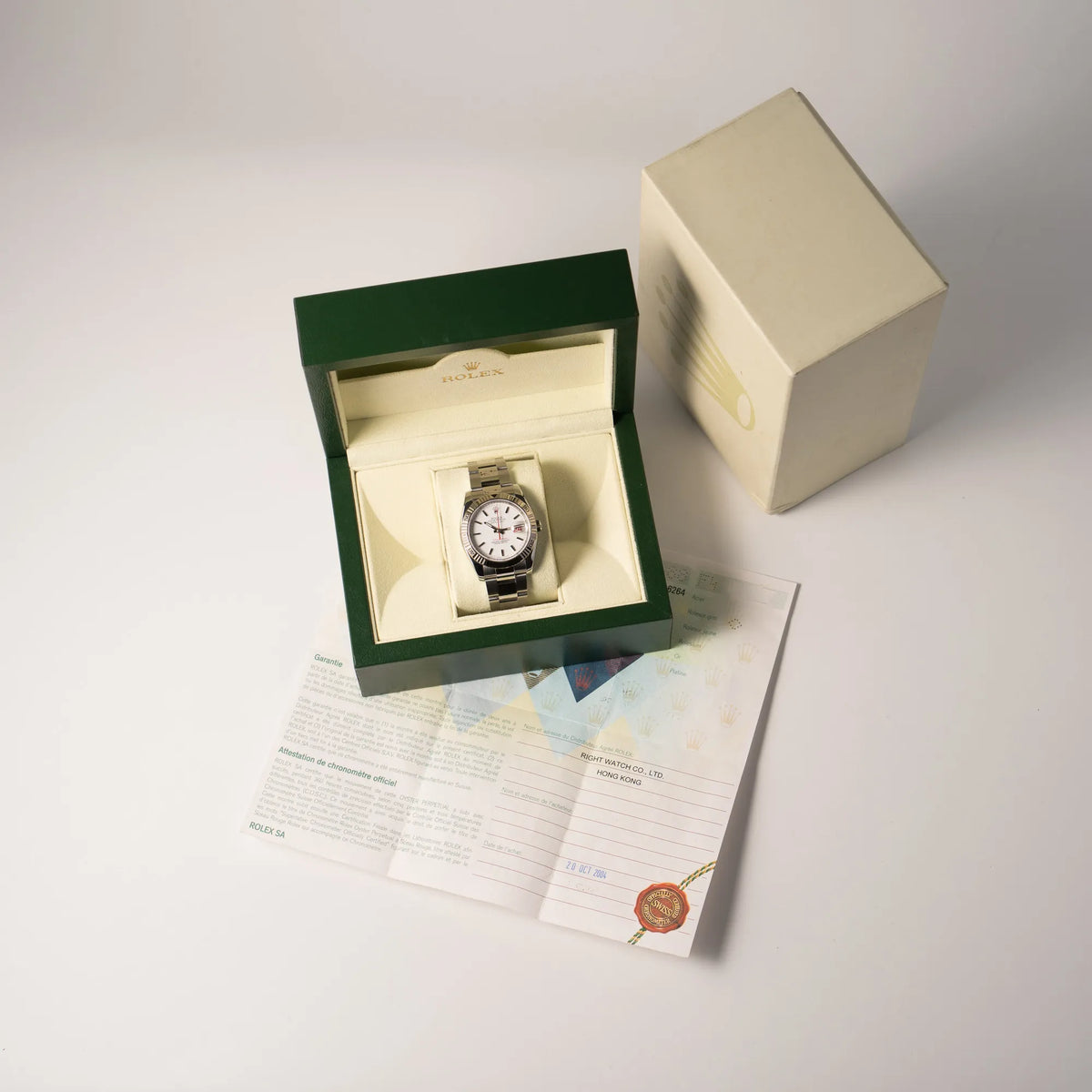 Rolex Datejust Turn-O-Graph 116264 in 36 mm mit dem weißen Zifferblatt und dem roten Sekundenzeiger zusammen mit dem Lieferumfang, bestehend aus Box und Papieren
