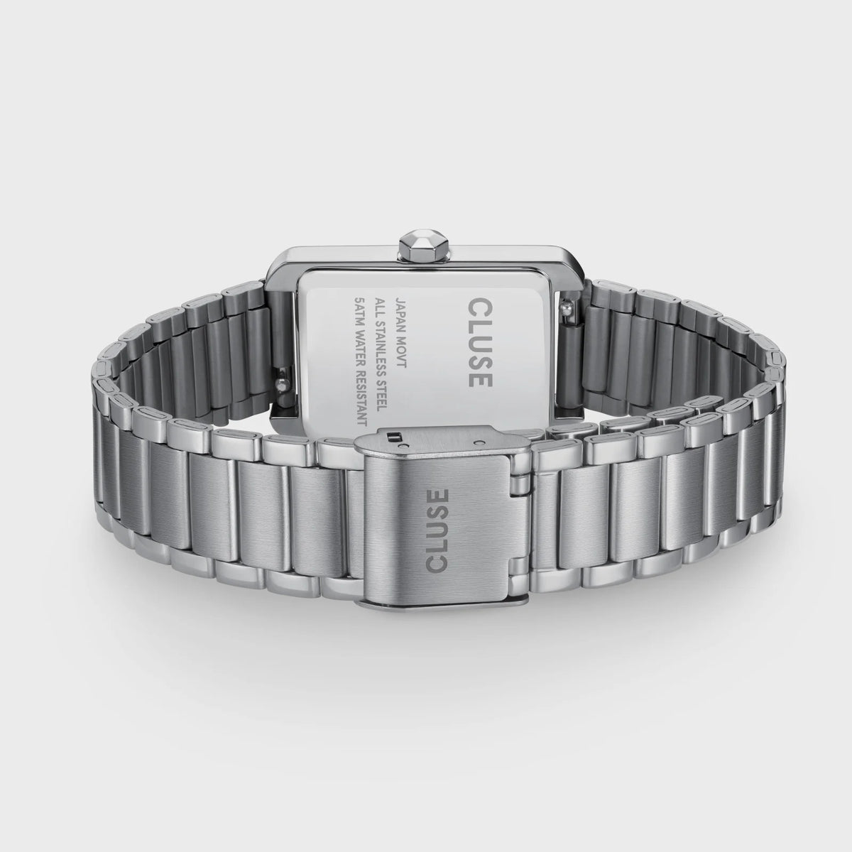 Blick auf das Armband, aufgebaut aus 3 Elementen, von der silberfarbenen Cluse Belisenna Damenuhr mit länglichem,  rechteckigem Gehäuse und weißem Zifferblatt mit römischen Indizes