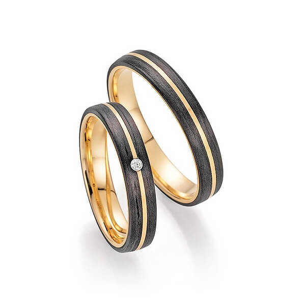 Fischer Trauringpaar Modell French Love in Gelbgold und Carbon, mit Diamant im Damenring