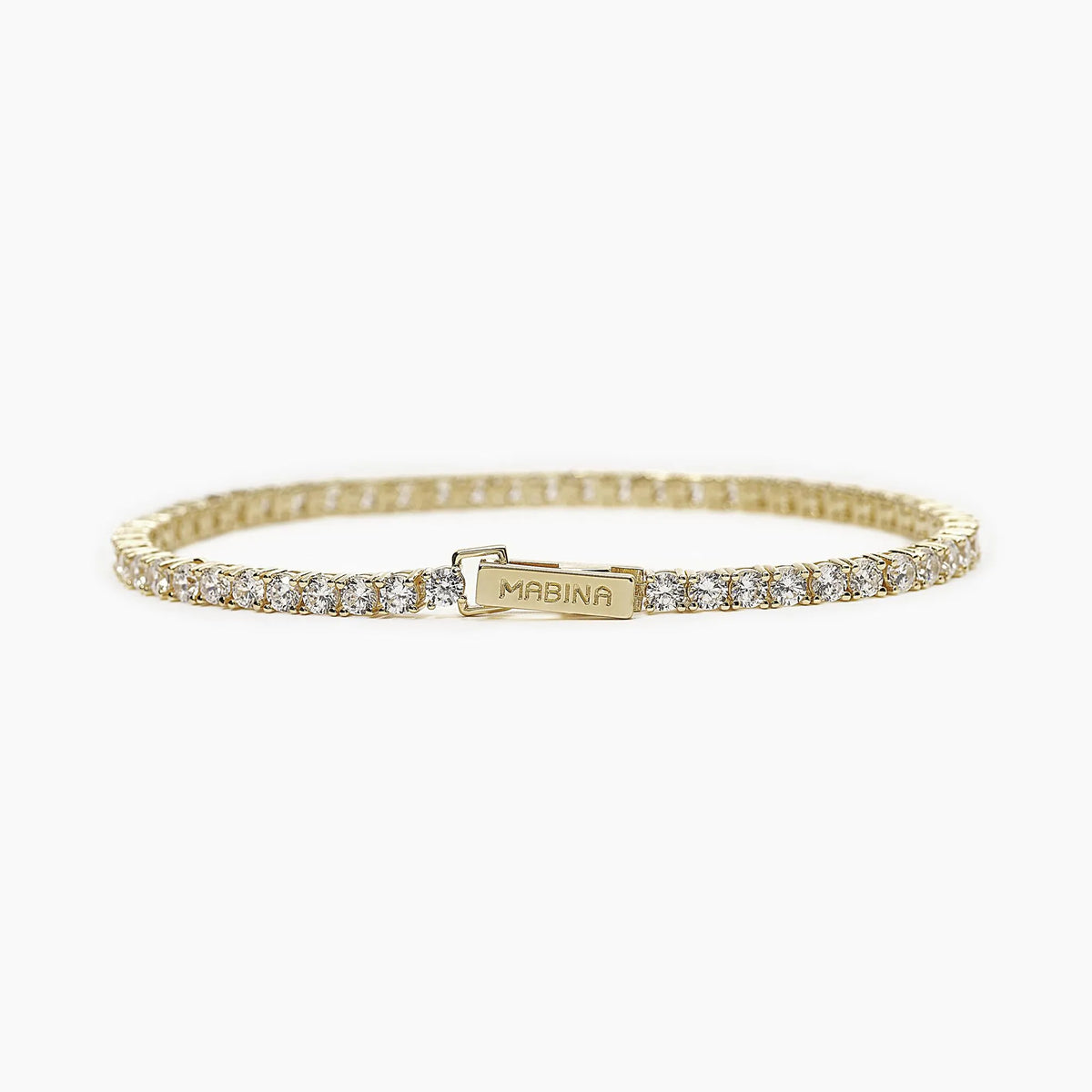 Produktfotografie des vergoldeten Tennisarmbands mit Zirkonia Steinen aus Silber