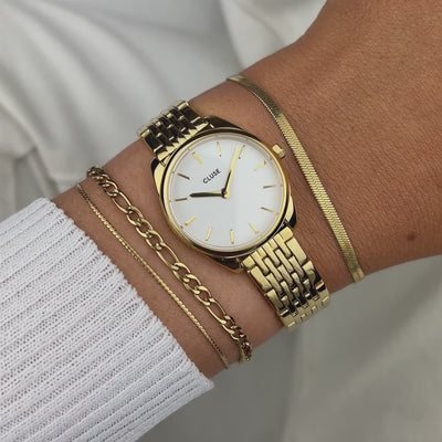 Produktvideo mit der goldfarbenen Cluse Damenuhr Feroce Mini CW11705 mit rundem Gehäuse, einem weißem Zifferblatt und einem feingliedrigem, goldfarbenem Uhrenarmband