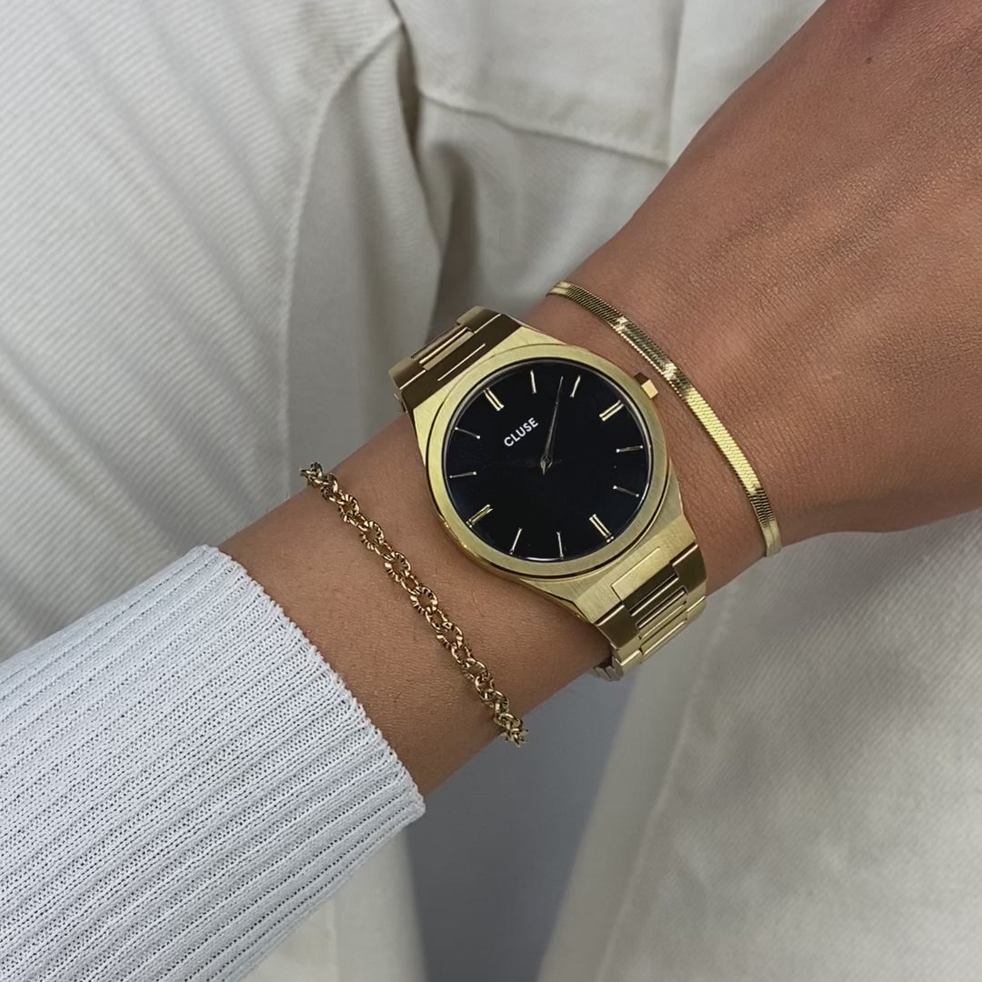 Produktvideo der goldfarbenen Cluse Damenuhr Vigoureux CW101210007 mit schwarzem Zifferblatt und am Gehäuse integrierten, goldfarbenem Armband